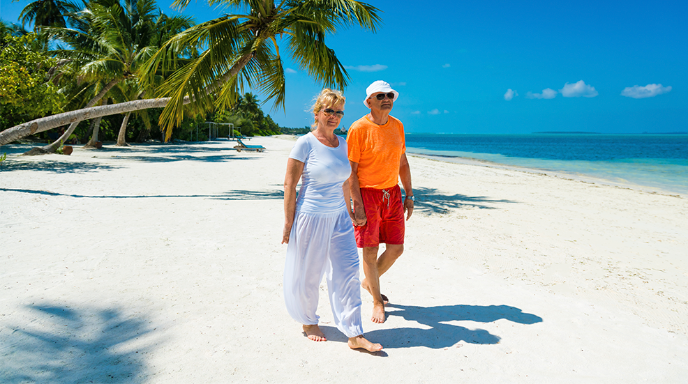 Senior couple enjoying holidays at Maldives, Herathera island, Addu atoll